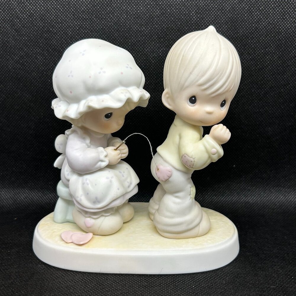 Precious Moments "Sew In Love” figurine